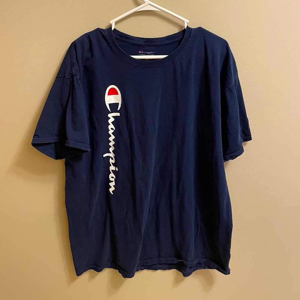 Blue Champion short sleeve shirt. Size is XL